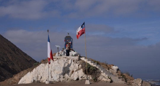 Angie at the monument for the Virgen del Carmen on the Cuesta del Paposo