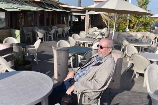Resting my eyes after lunch on the beach - it's a hard life!